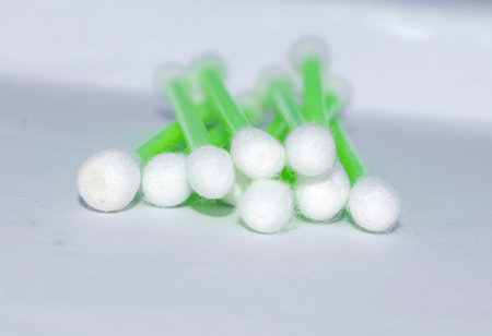 white cotton buds isolated on white background healthcare medical harm effect ear cleaning dangerous bad habitの写真素材