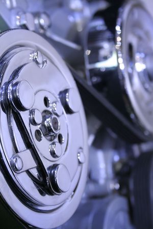 Close up shot of engine showing belts and chainsの写真素材