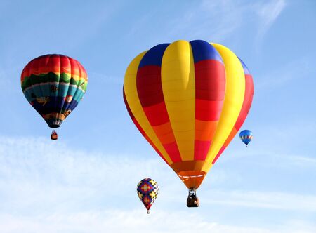Colorful balloons flying in the sky の写真素材