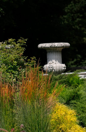 An empty flower pot in a beautiful park