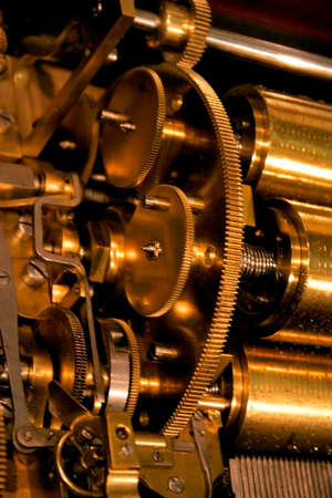 Mechanical gears of gold vintage equipment close up shotの写真素材