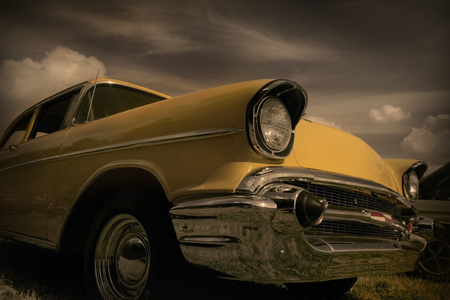 Yellow classic car front side view in sepia color toneのeditorial素材