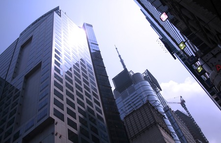 Multi story buildings at financial district of Manhattanの写真素材