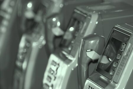 Close up shot of public telephones in monochromeの写真素材