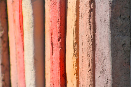 background of many colorful bricks in a rowの写真素材
