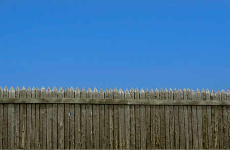 An abstract of wooden fence with blue sky background