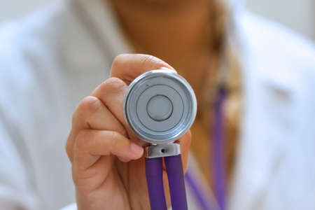 Doctor Holding Stethoscopeの写真素材