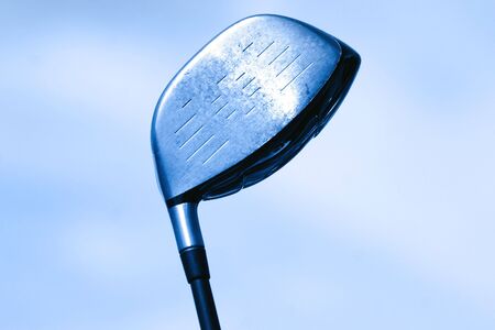 Golf club against sky background in blue color toneの写真素材