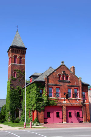Historic church with green plant cover の写真素材