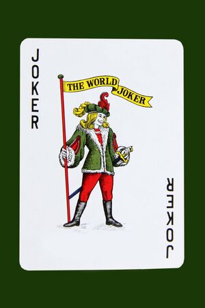 Isolated joker card on dark green backgroundのeditorial素材