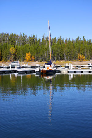 Boats on the dock in morning time in yellowstone national parkの写真素材