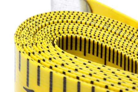 Close up shot of yellow measurement tape