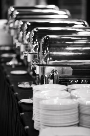 Many buffet trays ready for service in black and white. の写真素材