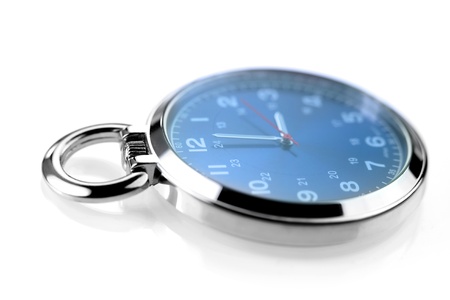 Blue pocket watch on white backgroundの写真素材