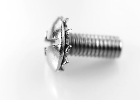 Close up shot of small metal screwの写真素材