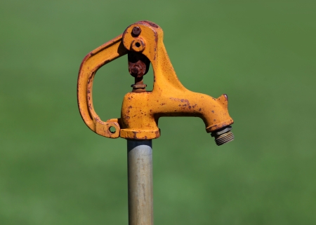 Close up shot of old mechanical garden pumpの写真素材