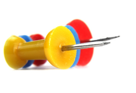 Extreme close up shot of three push pins
