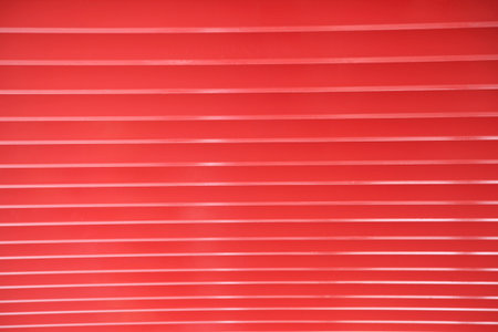 Row of red beams on the building roofの写真素材