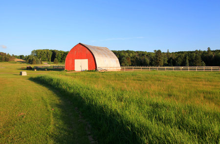 Small red barn in the farm