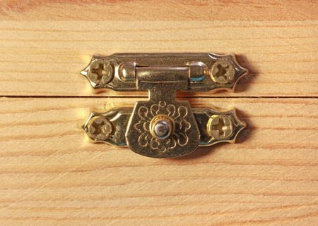 Latch on wooden box close up shotの写真素材