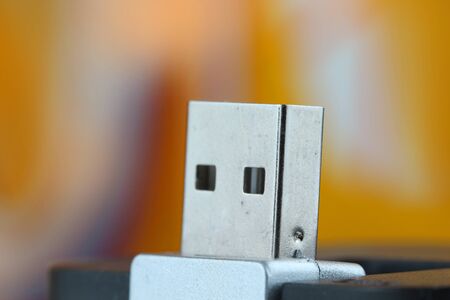 Close up shot of USB against colorful backgroundの写真素材