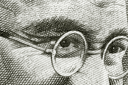 Close up shot of Gandhi on rupee noteのeditorial素材