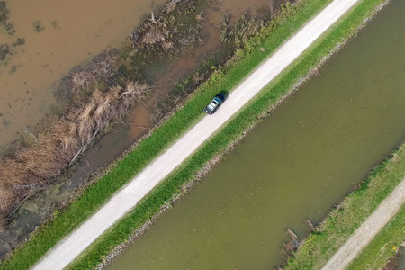 Aerial view of Marsh Lands and gravel road