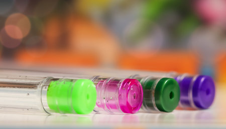 Colorful ball point pens with colorful background