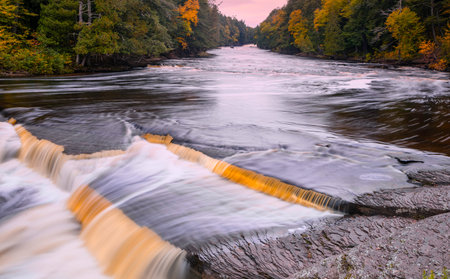 Manido falls  in Presque isle state park near Porcupine wilderness forest in Michigan upper...