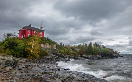 Marquette Harbor light house at Superior lake shore near Marquette city in Michigan upper peninsulaの写真素材