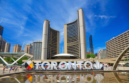 Toronto, Canada -June 23, 2019 : Toronto's modern City Hall is landmark complex and city Mayer's office at Nathan Phillips Square.のeditorial素材