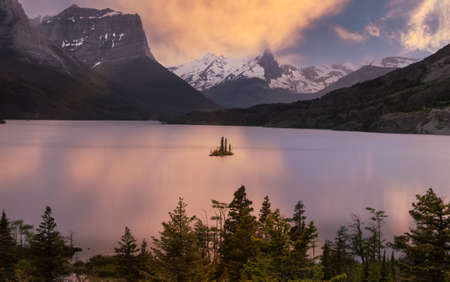 Wild goose island in Glacier national park after sunset.の写真素材