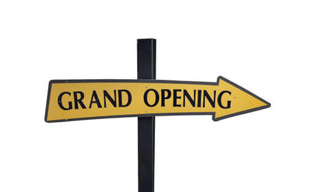 Sign board shows Grand opening isolated on white backgroundの写真素材