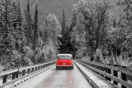 Red tour bus in Glacier national park, Montana.の写真素材