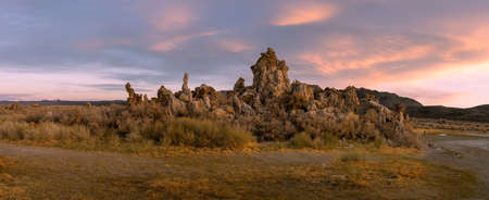 Tall Tufa sedimentary formation by mono lake in California under evening sun light.の写真素材