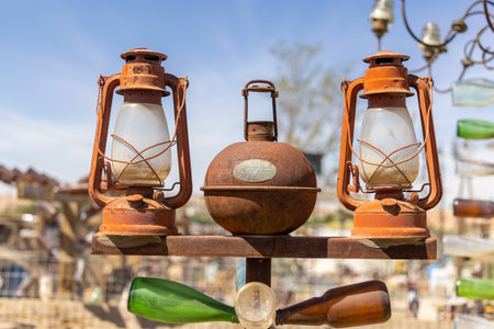 San Bernardino County, CA, USA â March, 31, 2022: Vintage lamp post at Elmer's Bottle Tree Ranch on Route 66.のeditorial素材