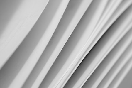 Abstract background of the smooth transition of the paper stack, selective focus.の写真素材