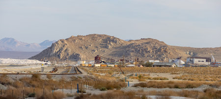Trona Valley, CA, USA â April, 2, 2022: Searles lake mineral extraction facility in Trona Valley .Is a raw materials mining and production company on Borax, Soda, Salt cake.のeditorial素材