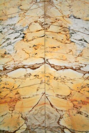 A real ancient yellow colored marble texture with luxury veins.の写真素材