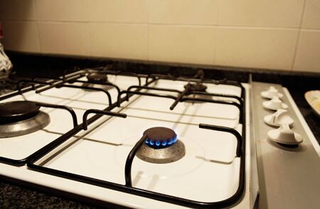 A natural gas burner from a stove in a kitchenの写真素材