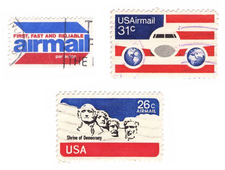 A collection of vintage US stamps: airmail, flag, Mt.Rushmore...のeditorial素材