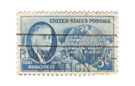 A vintage Us stamp commemorating Us president Roosevelt with quote "Freedom of speech and religion, from want and fear"の写真素材