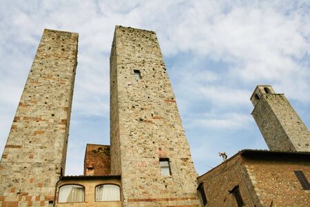 San Gimignano with its tall towers in Tuscany, Italyの写真素材