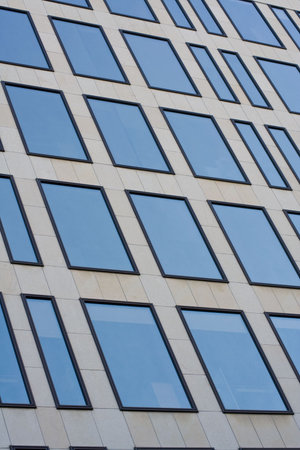 Skyscraper facade. Detail with large windows.