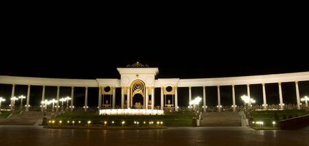New modern square in almaty, kazakhstan, at nightの写真素材