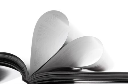 Pages in the book bent in the form of heartの写真素材