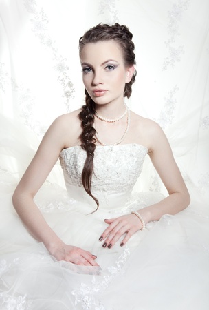 Very beautiful girl the bride, with the imposed make-up and a hairdressの写真素材
