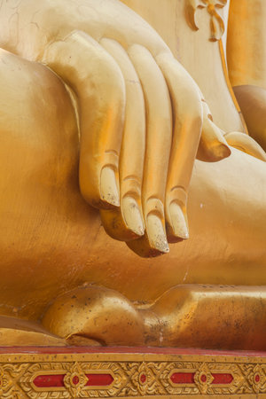 Hand golden Buddha from Thailandの写真素材