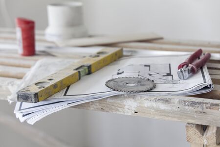 The tool of the master lies on a wooden rackの写真素材