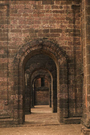 Ancient Doors Tunnel in Old Goa, Indiaの写真素材